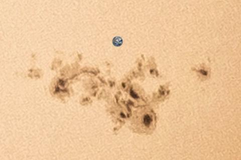 Image created by Jason Major, shared on X, to show the proportion of this sunspot and our planet. // Source : @JPMajor